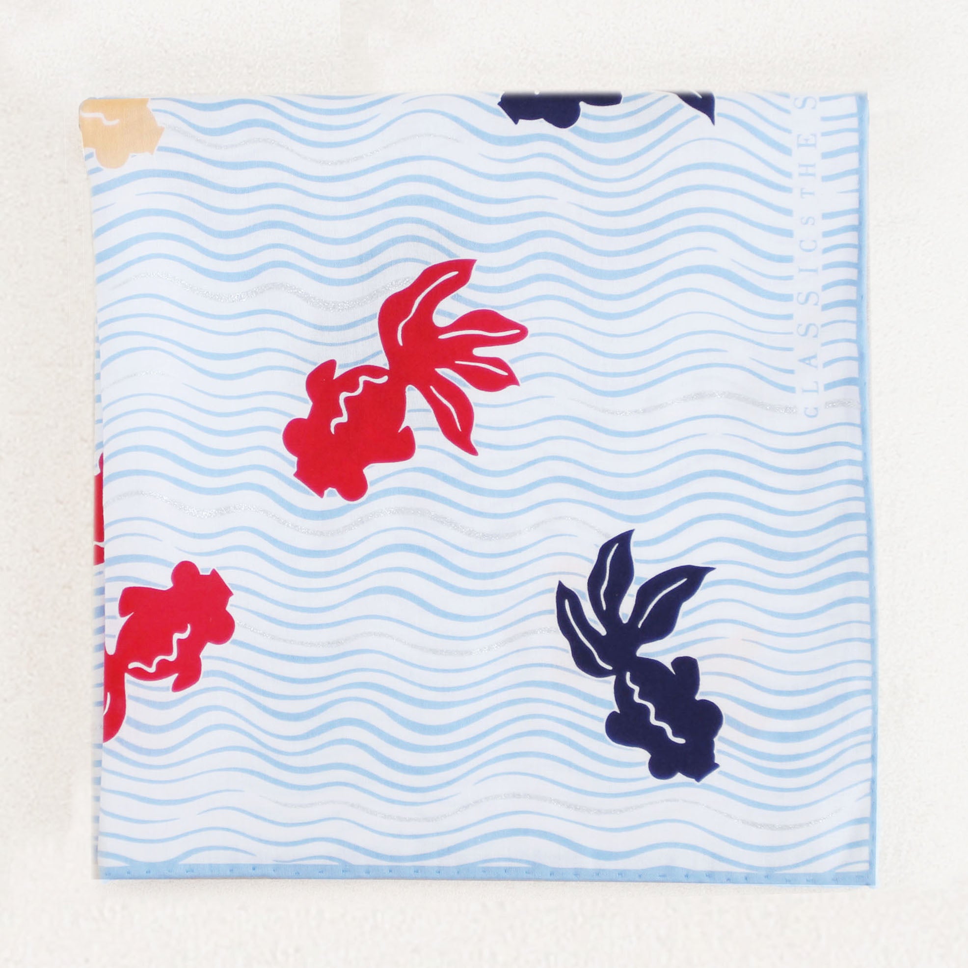 festival game in which participants try to catch goldfish in a shallow paper ladle