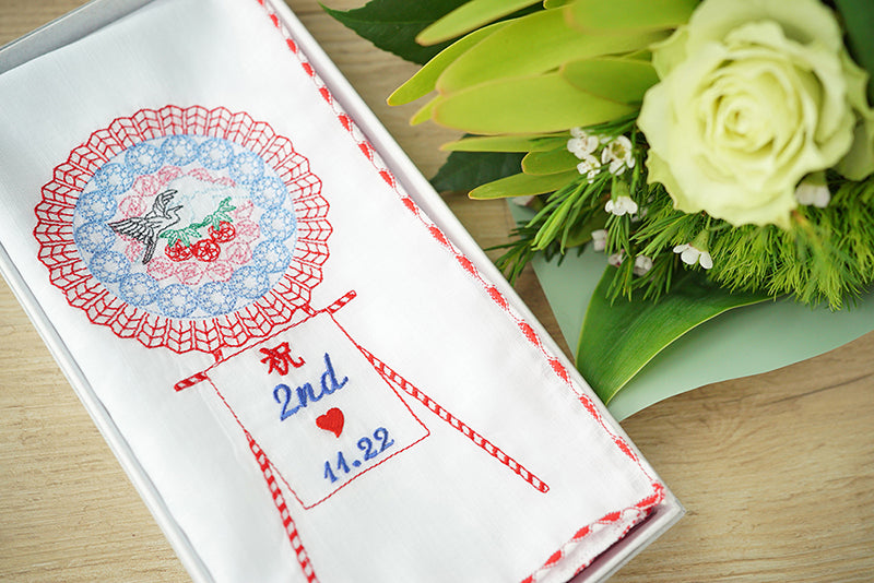 5月20日(月)より、お祝いの想いを届ける、「花輪」をモチーフにしたハンカチを発売