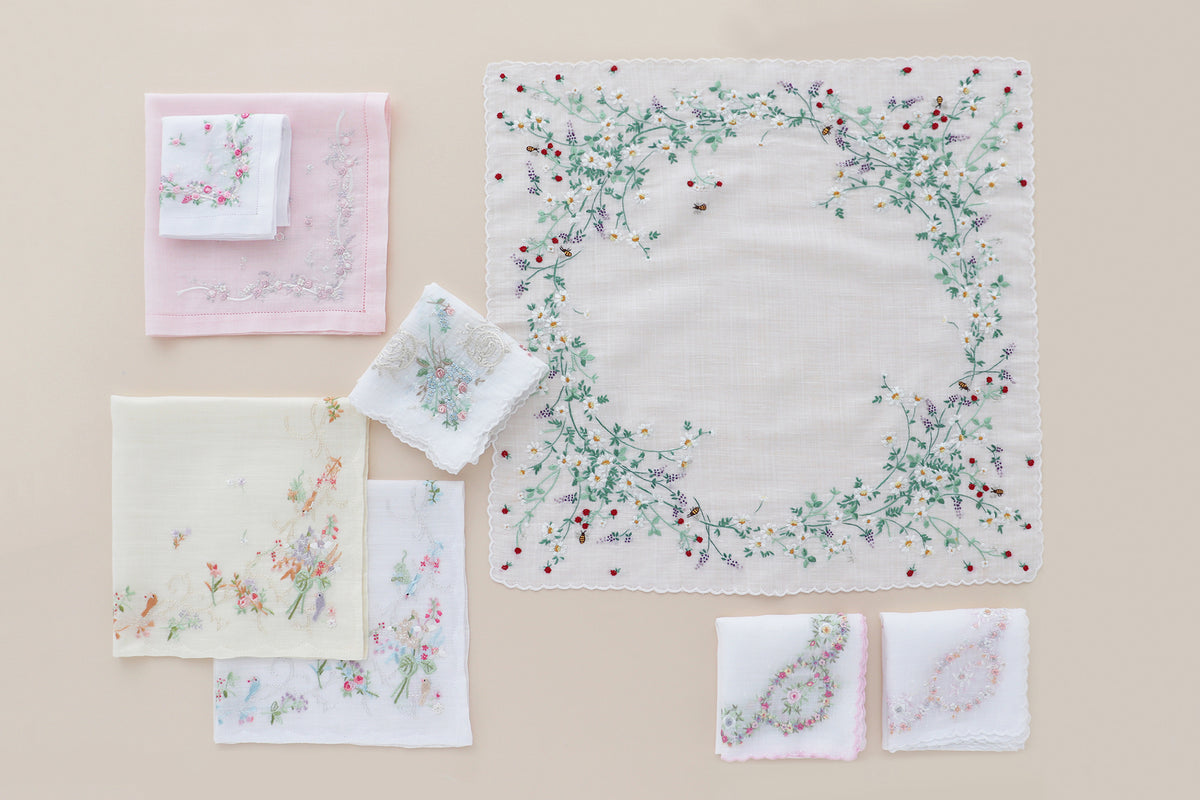 New Vietnamese hand-embroidered handkerchiefs full of warmth to go on