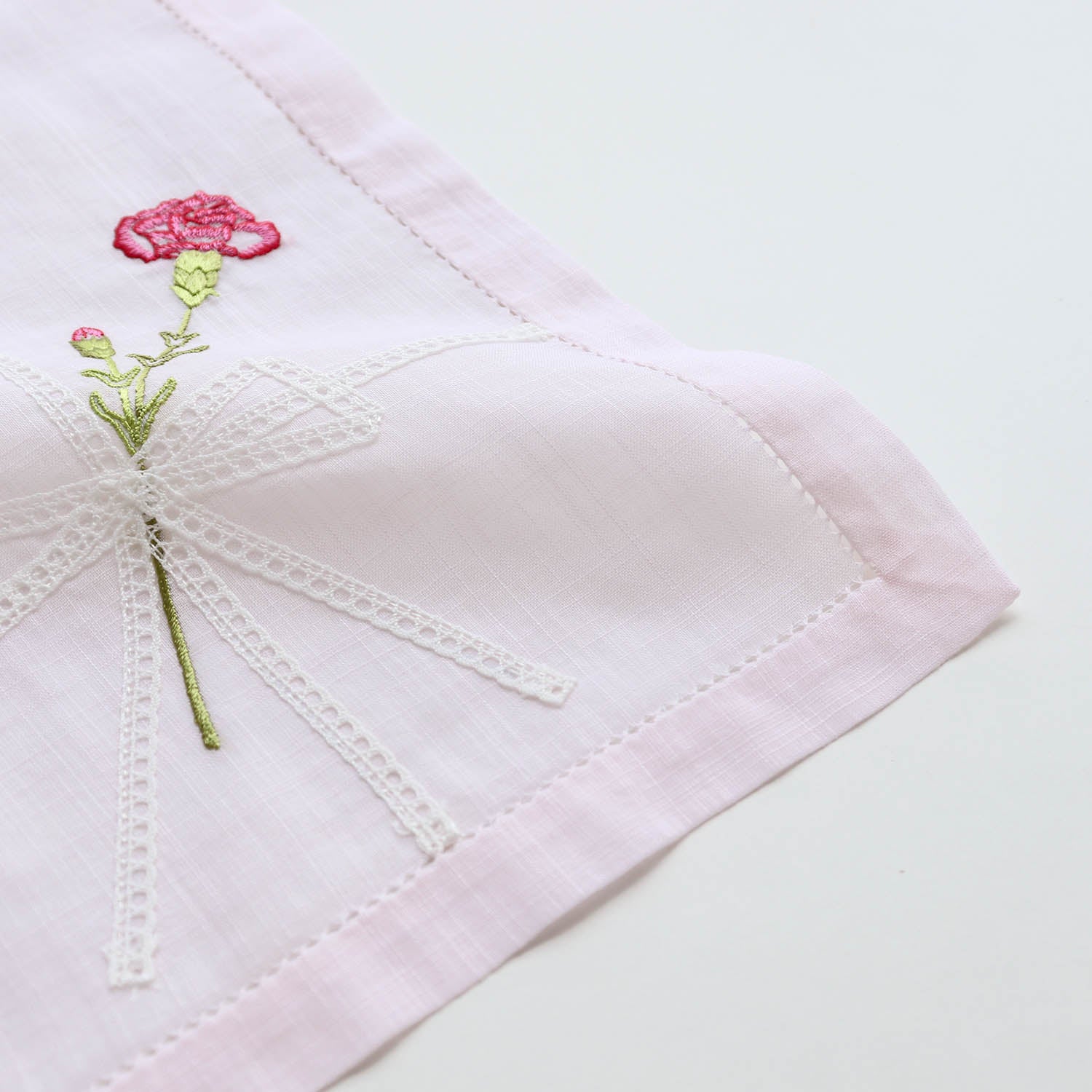 Vietnamese hand-embroidered handkerchief with carnation ribbon