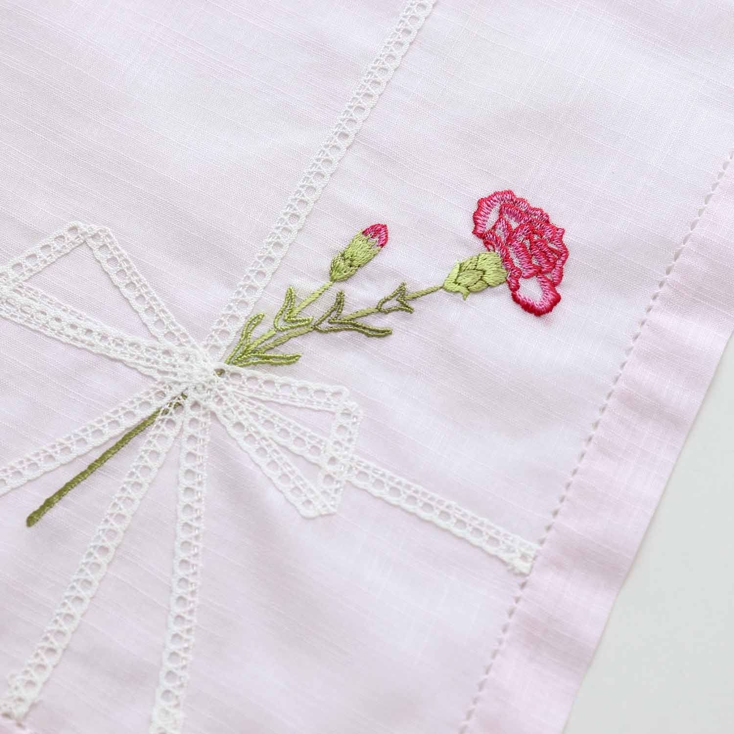 Vietnamese hand-embroidered handkerchief with carnation ribbon