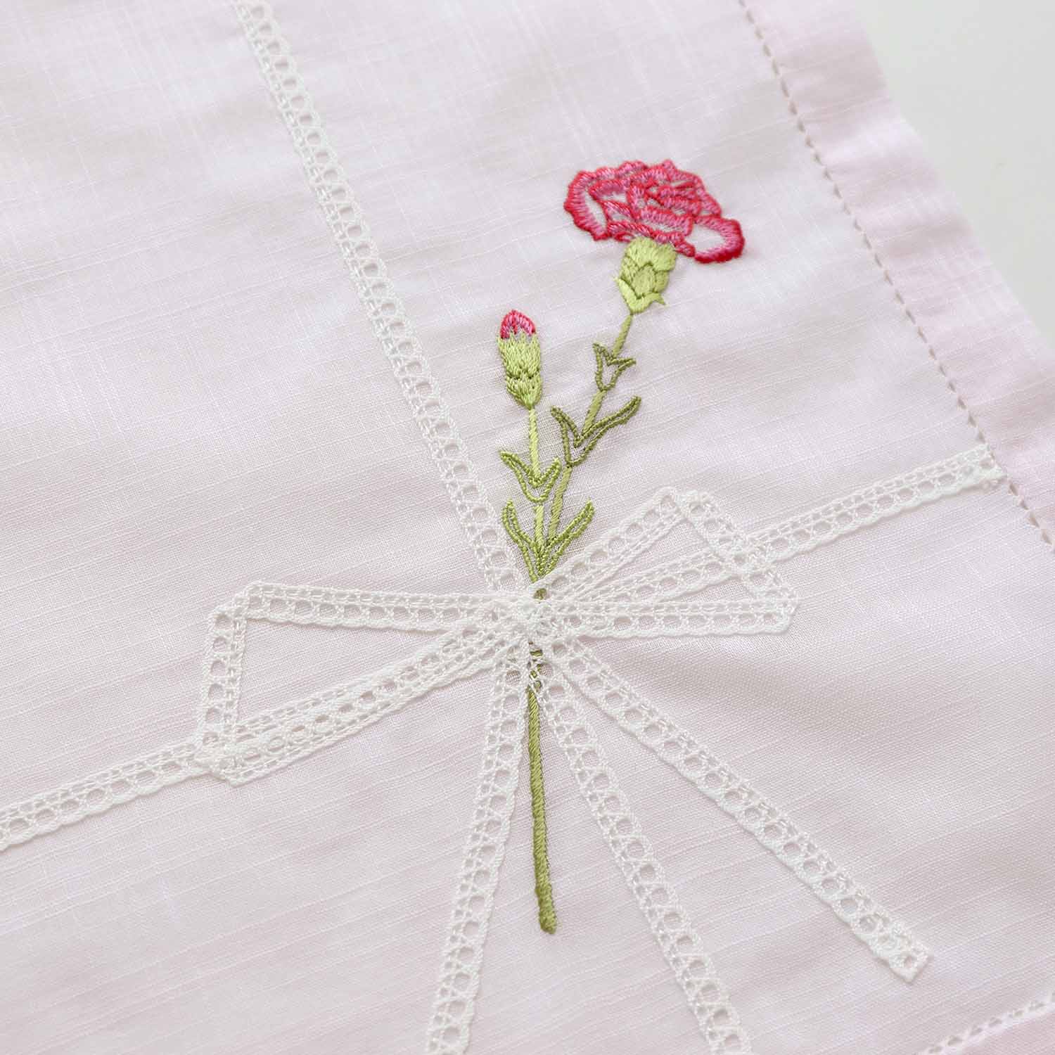 Vietnamese hand-embroidered handkerchief with carnation ribbon