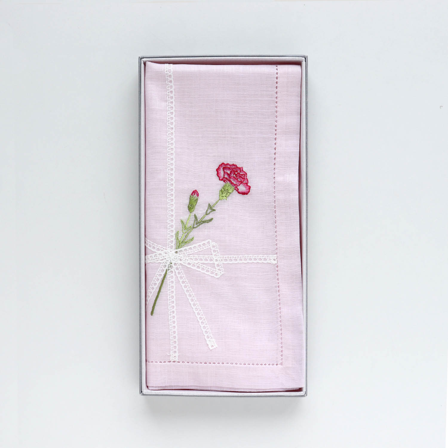 Vietnamese hand-embroidered handkerchief with carnation ribbon