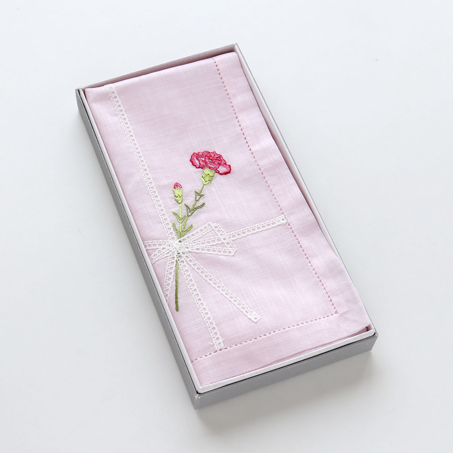 Vietnamese hand-embroidered handkerchief with carnation ribbon